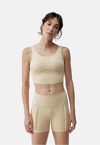 Born Living Yoga Sporttop 'Sayani' in Beige: voorkant