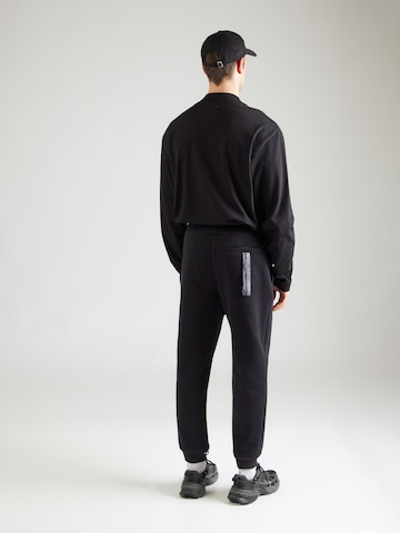 Effilé Pantalon 'Fabiano' Carlo Colucci en noir