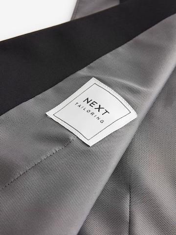 Next - Colete de fato em preto