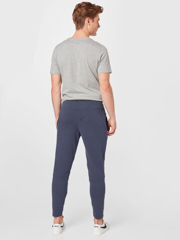 Effilé Pantalon de sport Hummel en bleu