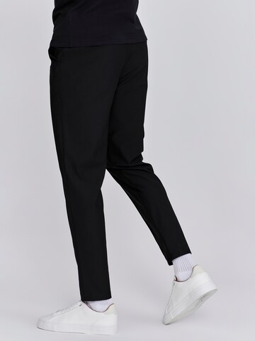Loosefit Pantaloni cargo di SikSilk in nero