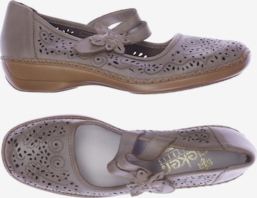 Rieker Flats & Loafers in 40 in Brown: front