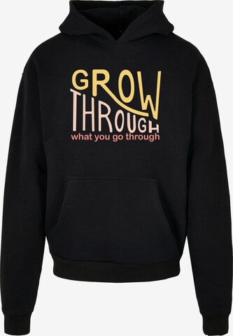 Sweat-shirt 'Spring - Grow Through 2' Merchcode en noir : devant