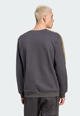 ADIDAS ORIGINALS Sweatshirt 'Manchester United Terrace Icons' in Schwarz