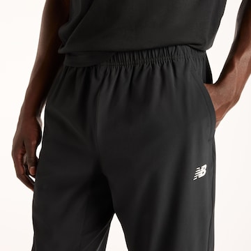 regular Pantaloni sportivi 'Utility' di new balance in nero