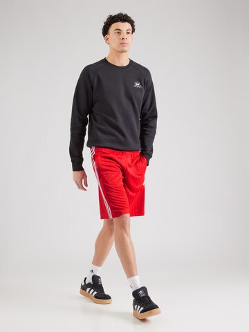 Regular Pantalon ADIDAS ORIGINALS en rouge
