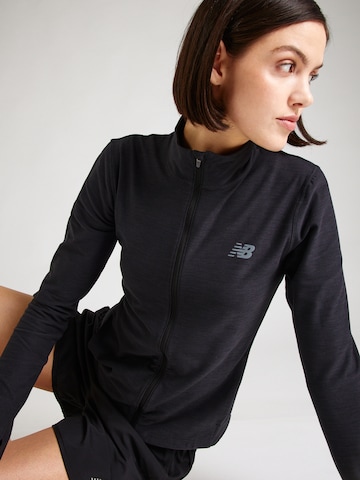 new balance Trainingsjacke 'Space Dye' in Schwarz