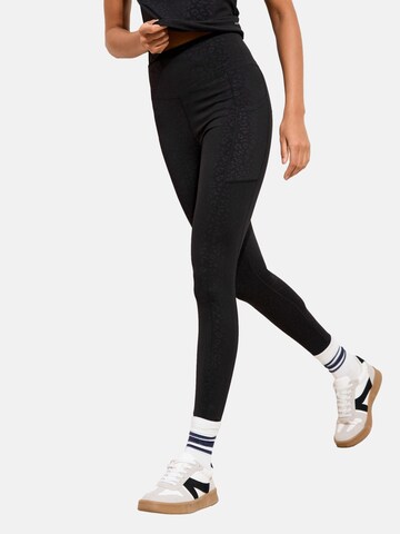 Friends Like These Skinny Leggings in Black: front