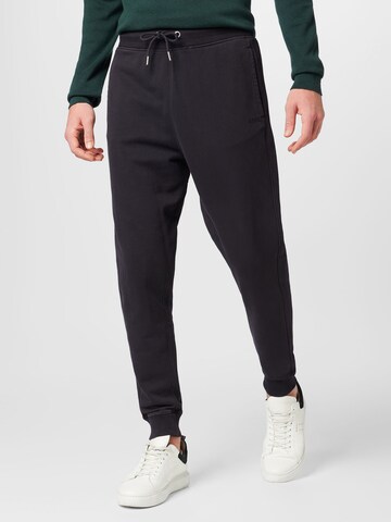 BOSS Tapered Pants in Black: front