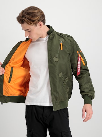 ALPHA INDUSTRIES Between-Season Jacket 'Falcon II' in Green