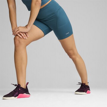 PUMA Skinny Sportbroek in Groen
