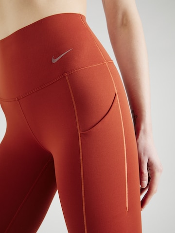 NIKE Skinny Športové nohavice 'UNIVERSA' - oranžová
