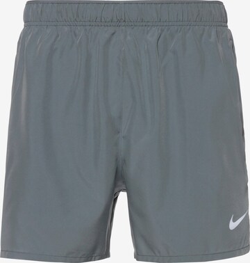 NIKE Regular Workout Pants in Grey: front