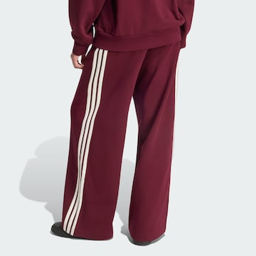 ADIDAS SPORTSWEAR Loosefit Urheiluhousut värissä punainen