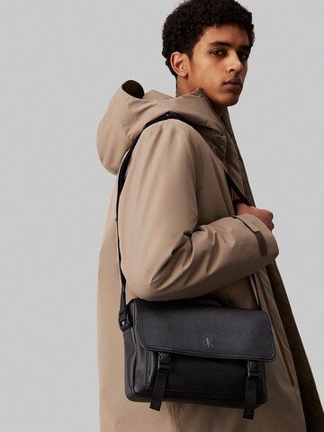 Sac à bandoulière Calvin Klein Jeans en noir : devant