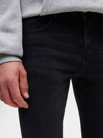 Skinny Jeans di Pull&Bear in grigio