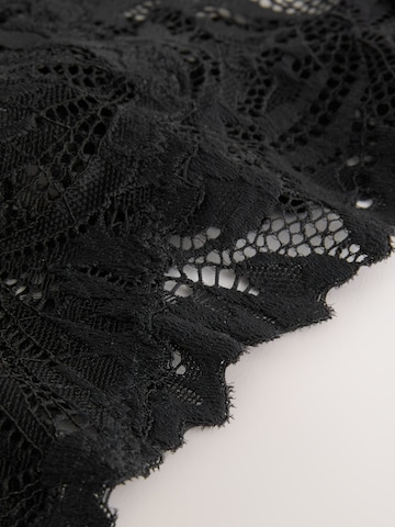 Next String 'Ultimate Comfort' in Zwart