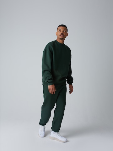 ABOUT YOU x Benny Cristo Regular Broek 'Keno' in Groen