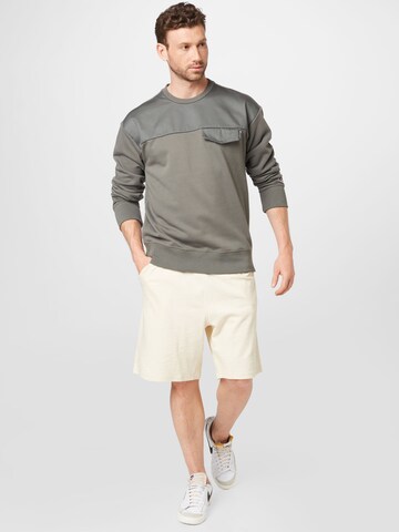 Champion Authentic Athletic Apparel Sweatshirt in Grey