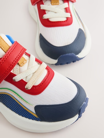 Baskets Next en blanc