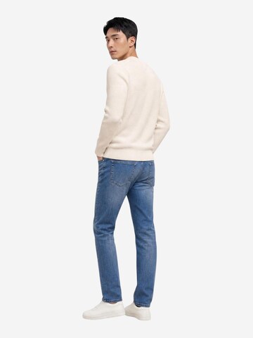 Pullover 'DM0DM20923' di Tommy Jeans in bianco
