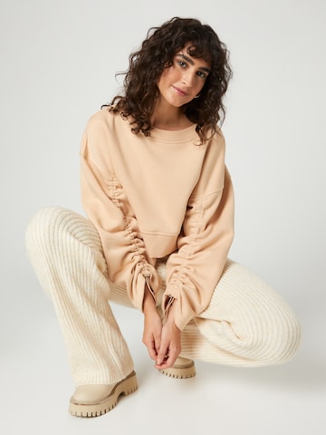 florence by mills exclusive for ABOUT YOU Sweatshirt 'Emmy' i beige