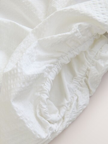 Haut Next en blanc