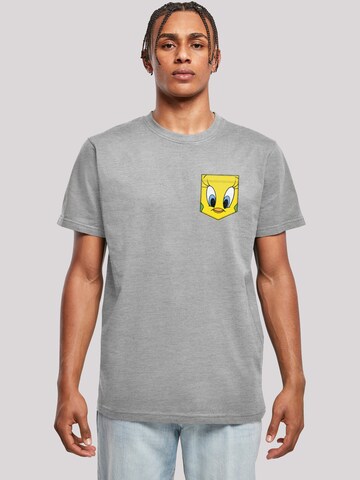 F4NT4STIC Shirt 'Looney Tunes Tweety Pie Face Faux Pocket' in Grijs: voorkant