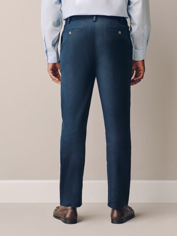 Next Slim fit Trousers with creases 'Motionflex' in Blue