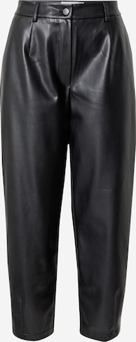 Karo Kauer Loose fit Pleat-front trousers in Black: front