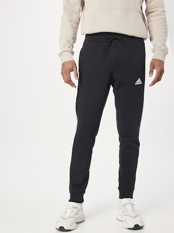 ADIDAS SPORTSWEAR Tapered Workout Pants 'Essentials' in Black: front