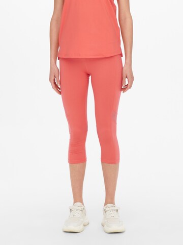 ONLY PLAY Skinny Sportbroek 'Camp' in Oranje: voorkant