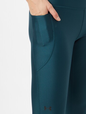 Skinny Pantalon de sport UNDER ARMOUR en vert