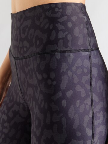 Reebok Skinny Sportnadrágok 'ID TRAIN' - fekete