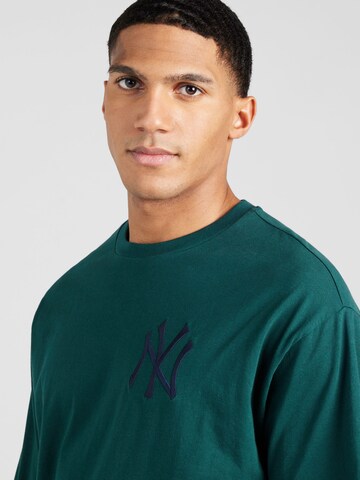 NEW ERA - Camiseta 'LEAGUE ESSENTIALS' en verde