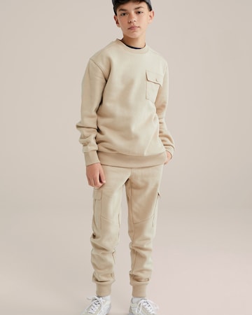 WE Fashion Конический (Tapered) Штаны в Бежевый