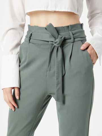 VERO MODA Slimfit Kalhoty se sklady v pase – zelená