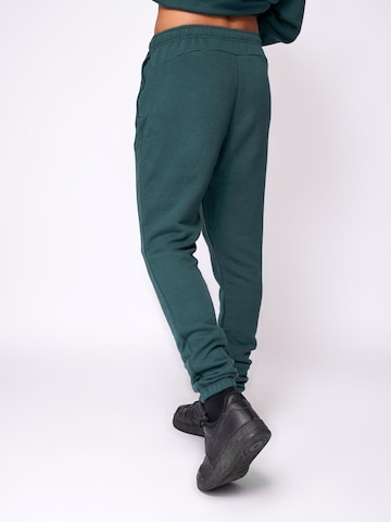 Fortex Fitness Slimfit Sportbroek 'Essential Jogger' in Groen