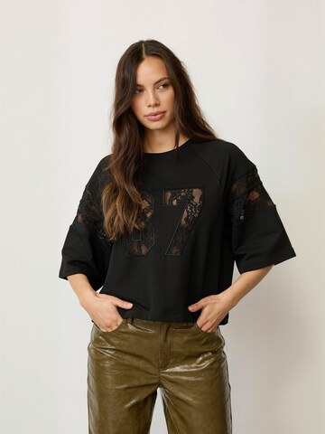 Haut ' Ely ' co'couture en noir : devant