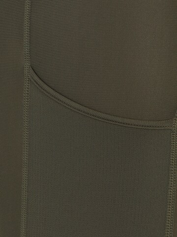 UNDER ARMOUR Skinny Spodnie sportowe w kolorze zielony