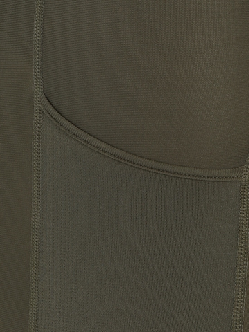 UNDER ARMOURSkinny Sportske hlače - zelena boja