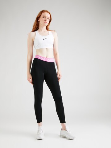 NIKE Skinny Spodnie sportowe 'NP 365' w kolorze czarny