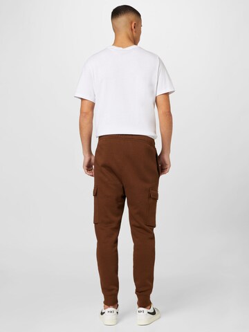 Nike Sportswear Tapered Cargo trousers in Brown