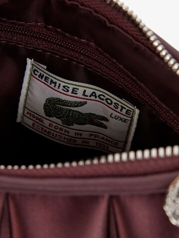 LACOSTE Kézitáska 'Lenglen' - lila