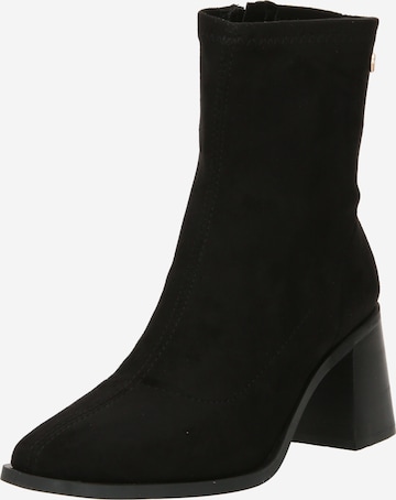 Xti Ankle Boots in Black: front