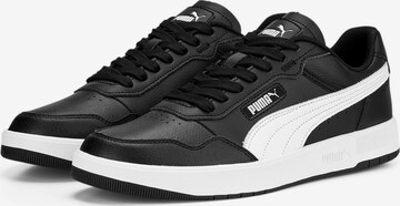 PUMA Sneakers in Black: front