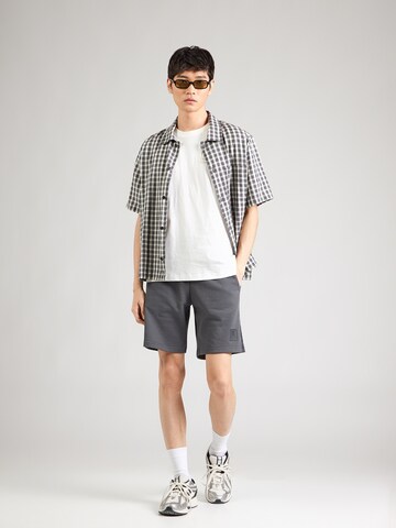 Champion Authentic Athletic Apparel Tričko – žlutá