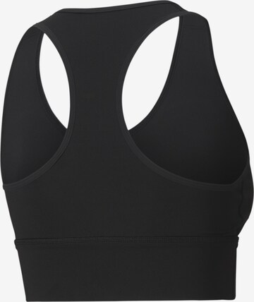 PUMA Bustier Sport bh in Zwart