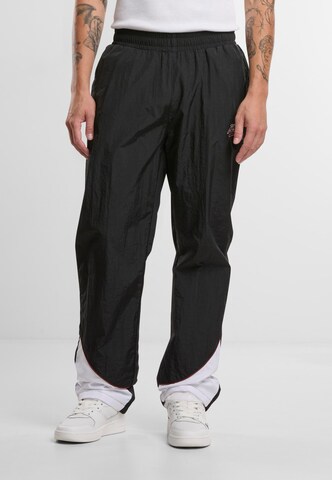 Karl Kani - Loosefit Pantalón en negro: frente