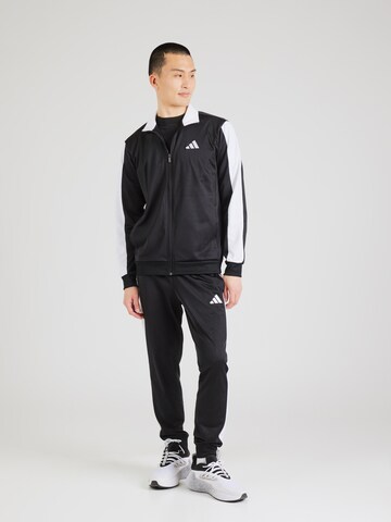 Survêtement ADIDAS SPORTSWEAR en noir : devant